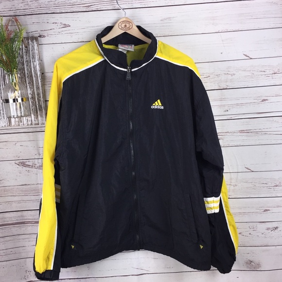 yellow adidas jacket with white stripes